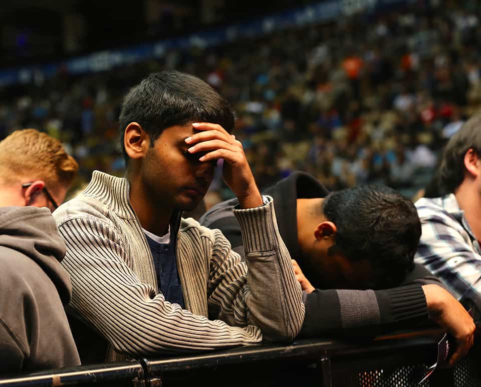 Young men pray