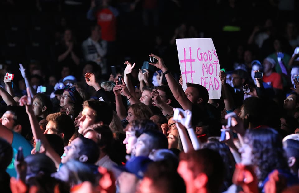 Fan holds poster