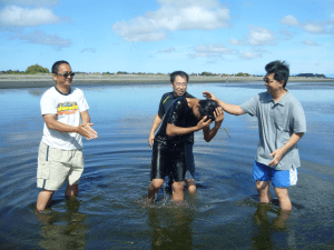 Pastor James With Pastors Art Fabian And Gerald Phang At Baptism