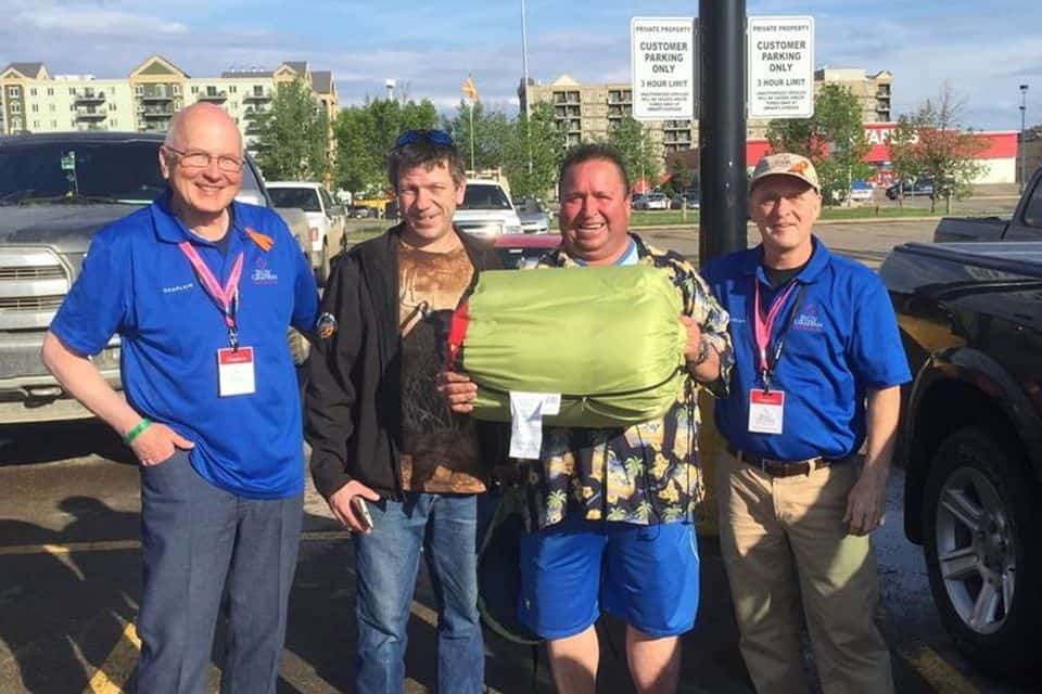 Our chaplains met these two Fort McMurray residents soon after the evacuation order was lifted. The group shopped for some sleeping bags, then joined hands and prayed outside. "Joe the plumber" (holding bag) expressed his thanks to God and our Association. In turn, we thank our supporters who make outreach work like this possible