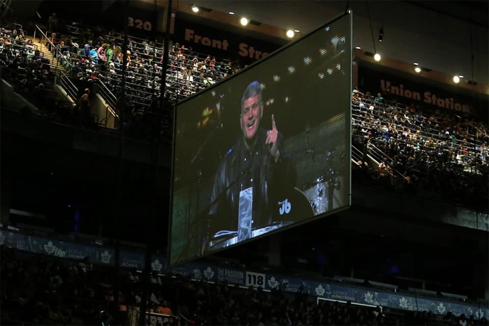 Franklin Graham speaking to people, jammed up into the rafters. Nearly 16,000 people packed the Air Canada Centre on Saturday.