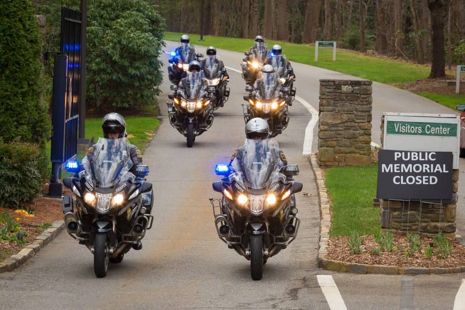A group of eight North Carolina Highway Patrol officers on motorcycles led the motorcade.
