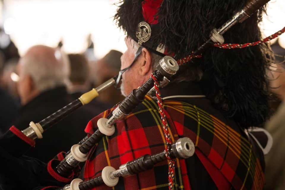 After Rev. George Battle Jr.'s closing prayer, Pipe Major William Boetticher played "Amazing Grace" and led the family processional back into the Billy Graham Library.