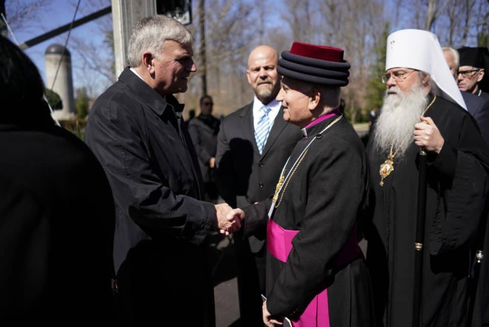 Franklin Graham talks with His Grace Archbishop Mar Aprim Khamis and His Beatitude Tikhon, Metropolitan of All America (middle) and Canada Archbishop of Washington, Orthodox Church in America (right).