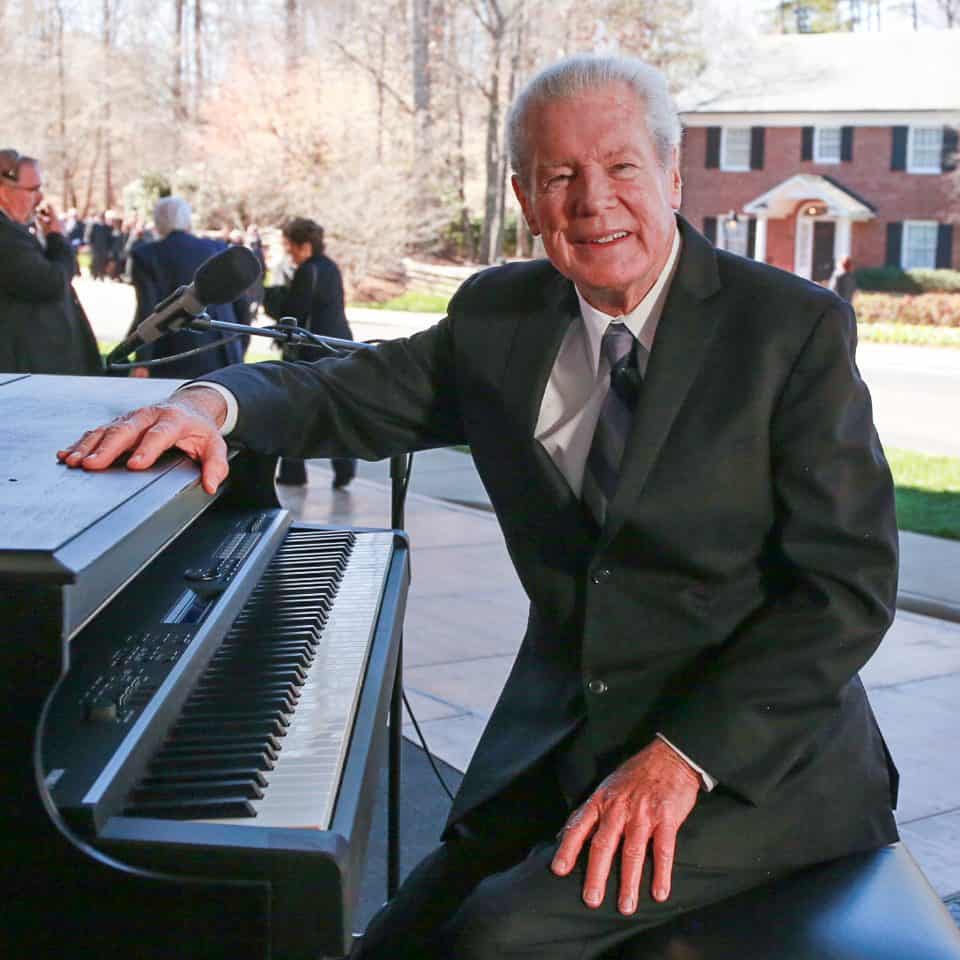 Longtime Crusade pianist John Innes played a medley of worship songs before the funeral.