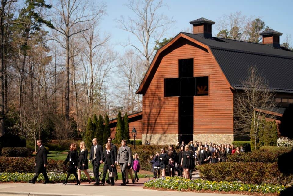 Billy Graham’s family walks from the Billy Graham Library to the funeral service.