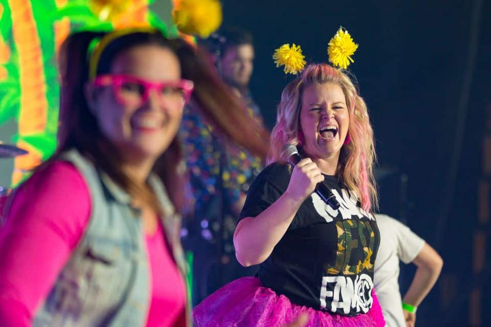 Angie Rogers, a well-known East Coast performer, led a high-energy performance of worship songs.