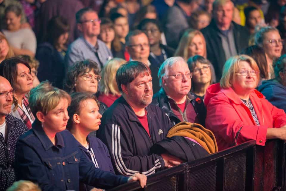 Attendees listen as Will Graham preaches about the prodigal son.