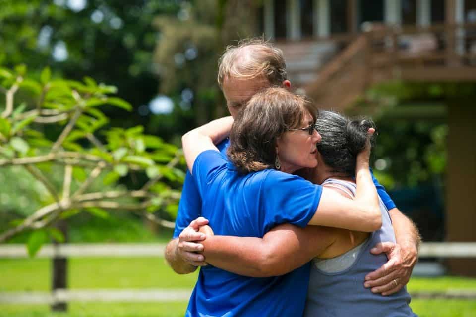 Since historic flooding turned parts of Northern Queensland, Australia, into a disaster zone, crisis-trained Billy Graham Rapid Response Team chaplains have been sharing comfort and hope with residents. In this 2018 file photo, chaplains spend time with a woman whose home was damaged by floods.