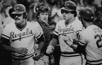 Clint Hurdle, second from right, heads to the dugout after he cleared the bases with a three-run blast on July 22, 1978. Hurdle knocked in six runs for the Royals as the Royals shut out the Red Sox 9-0.