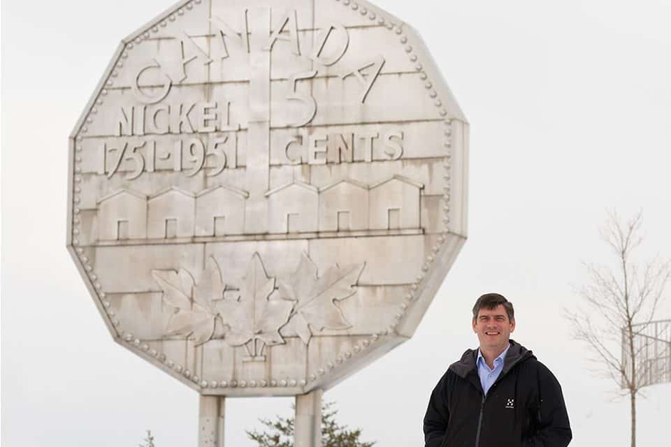 A lover of the outdoors, Will Graham enjoys visiting Canada, and more importantly, sharing God's love with the nation. Over the past two decades, he's held more than 15 Celebrations there. Here, he poses with the world's largest coin, Canada's "Big Nickel" in Sudbury.