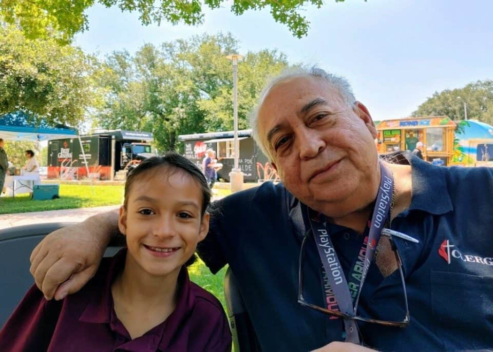 Pastor José René Martínez and his granddaughter, Angela.