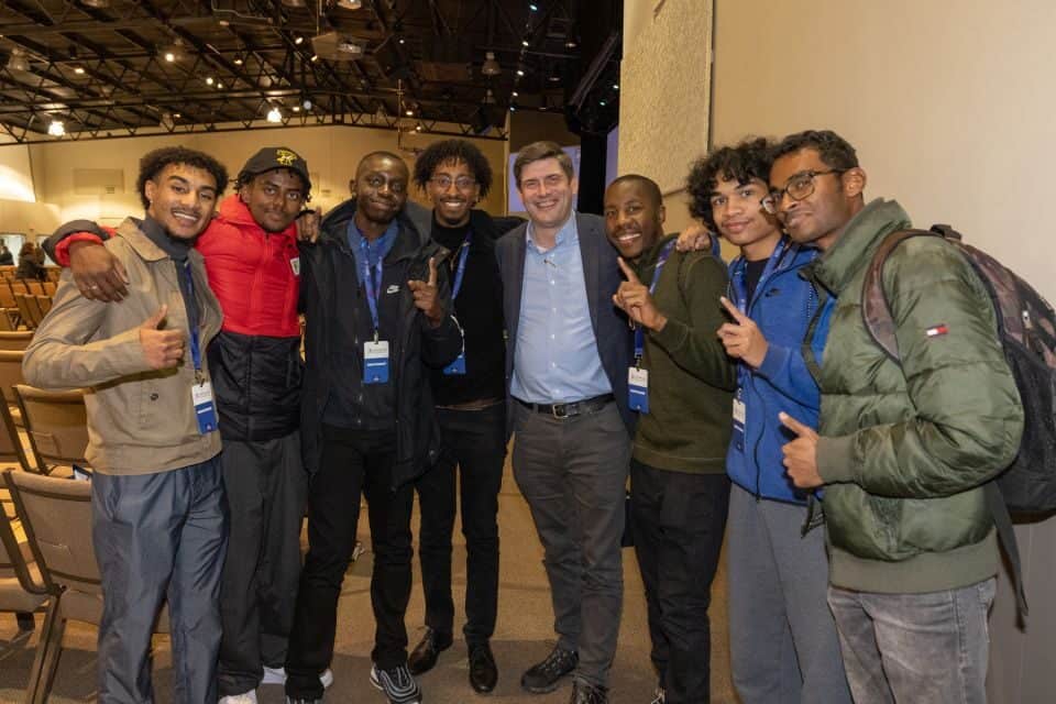 Will Graham, one of the speakers at the Calgary Summit, hangs out with young people who wanted to learn more about evangelism.