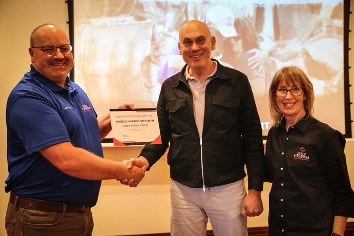 Andrew Stephanow (middle) works five days a week at a refugee relief center in Poland. “This training will be beneficial for the time I spend at the refugee centers,” he said. “It will improve and stabilize the knowledge I have on how to respond to those in trauma, which is so needed.” 