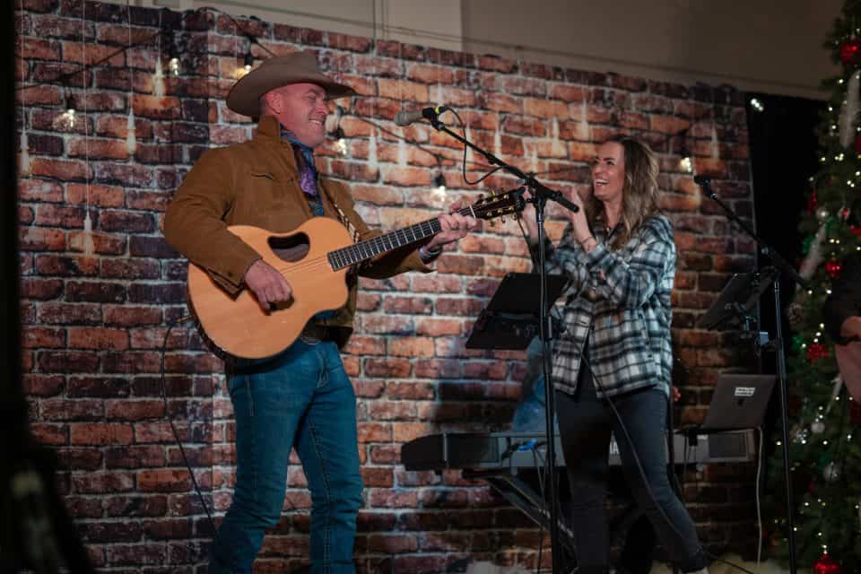 Canadian singers George Canyon and Brooke Nicholls led the audience in praising God at the intimate venue, Mamawi Community Hall.