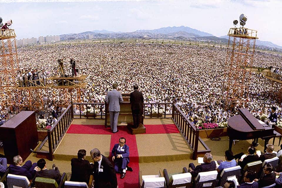 Billy Graham and his interpreter, Pastor Billy Kim, at the 1973 Seoul Crusade. At the final meeting (above) of the five-day evangelistic outreach, 1.1 million people heard the Gospel, the largest crowd the evangelist ever addressed in person.