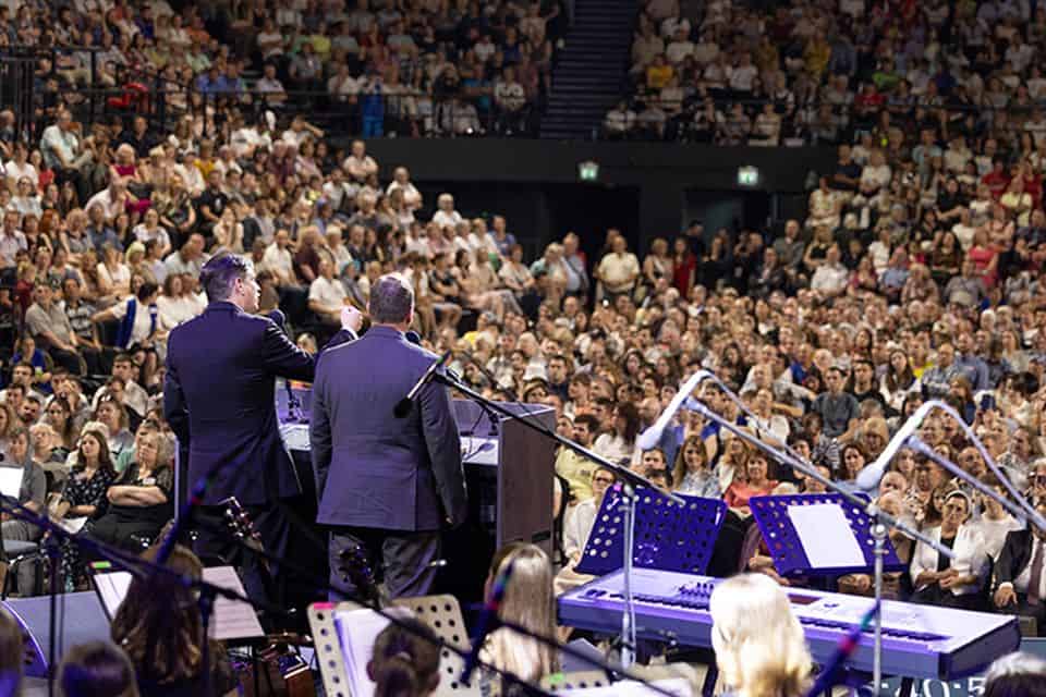 More than 8,850 people filled Chișinău Arena and spilled into overflow areas on the first night of the Celebration of Hope with Will Graham in Moldova. Some stood against the wall in the back of the arena and listened from doorways. Over 18,000 more watched the event online.