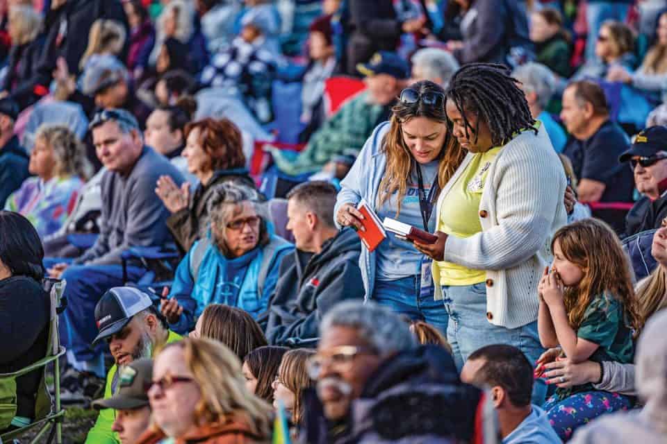 PRAYER TEAM VOLUNTEERS GAVE DISCIPLESHIP MATERIALS to all those who made decisions, as well as new Bibles to those who didn’t have one.