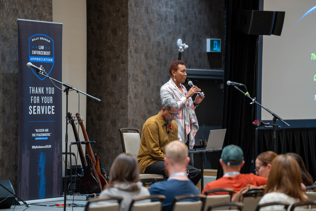 Sharing encouragement from the stage.