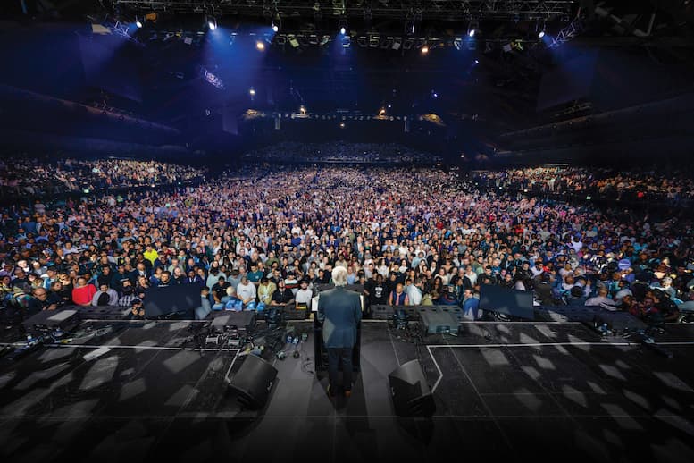 Franklin Graham praying with a resident in Kerrville, Texas.