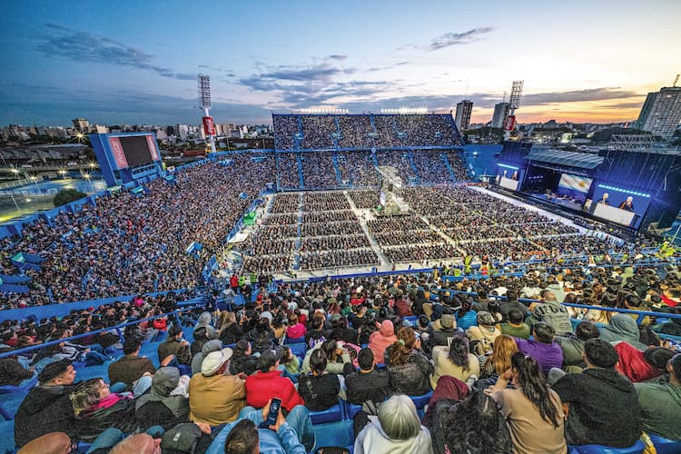Franklin Graham praying with a resident in Kerrville, Texas.