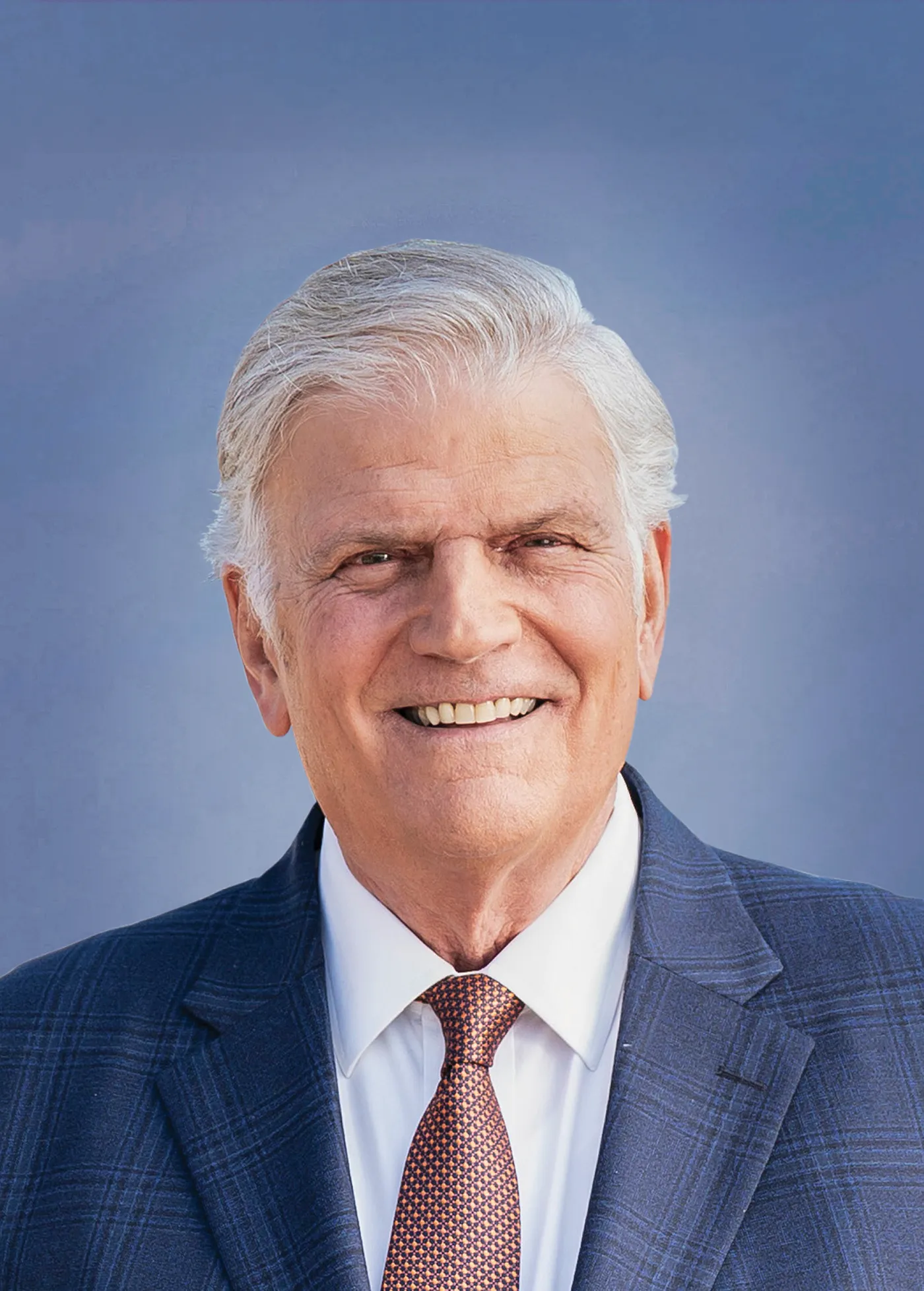 Chaplain praying with a family