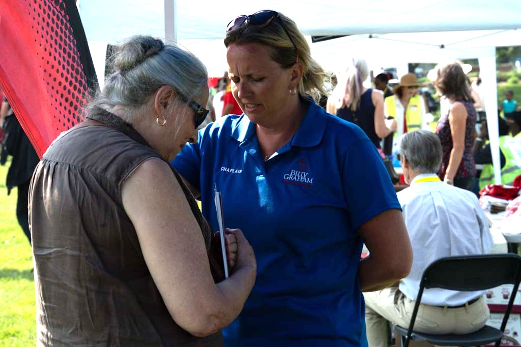 After the Prayer March, BG-RRT chaplains took time to pray with other believers and event onlookers.